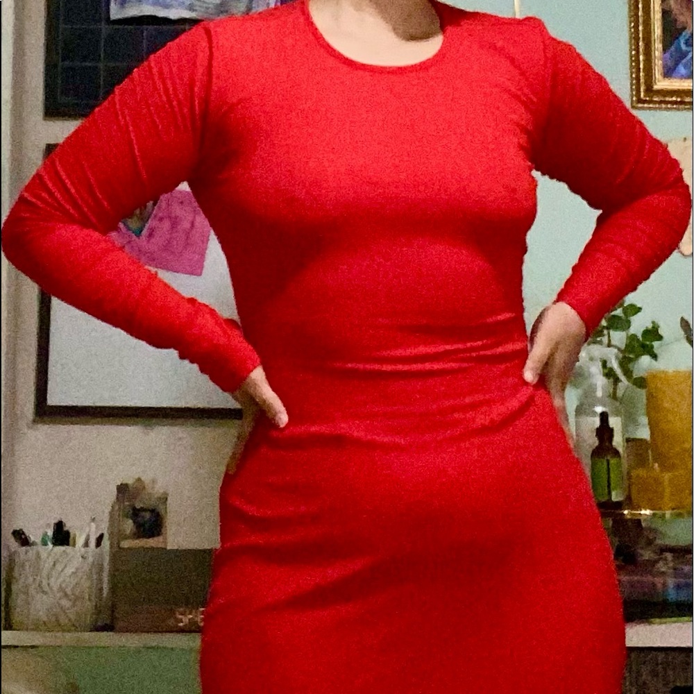 Mid-calf length stretchy red dress, open detail in the back, leg slits